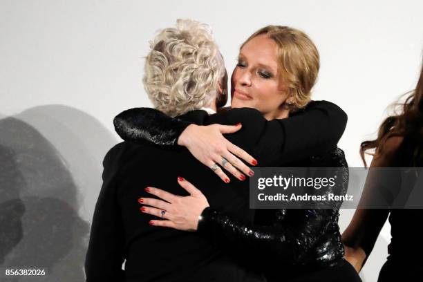 Glenn Close gets congratulated by her daughter Annie Maude Starke during the Golden Icon Award ceremony at the 'The Wife' premiere at the 13th Zurich...