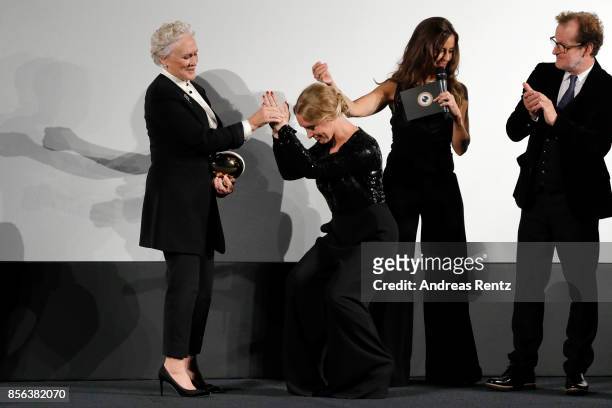 Glenn Close gets congratulated by her daughter Annie Maude Starke during the Golden Icon Award ceremony at the 'The Wife' premiere at the 13th Zurich...