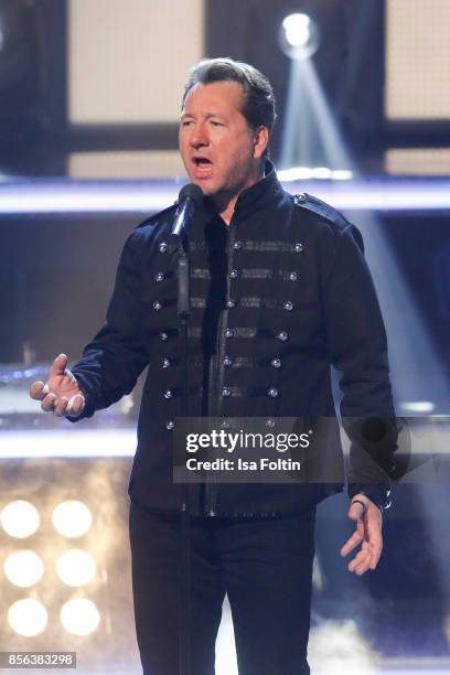 Claudius Dreilich, singer of the band Karat performs during the tv show 'Willkommen bei Carmen Nebel' at TUI Arena on September 30, 2017 in Hanover,...