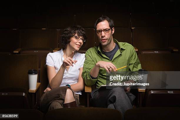 man and woman conducting casting call - casting call stock pictures, royalty-free photos & images