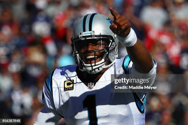 Cam Newton of the Carolina Panthers reacts during the fourth quarter against the New England Patriots at Gillette Stadium on October 1, 2017 in...