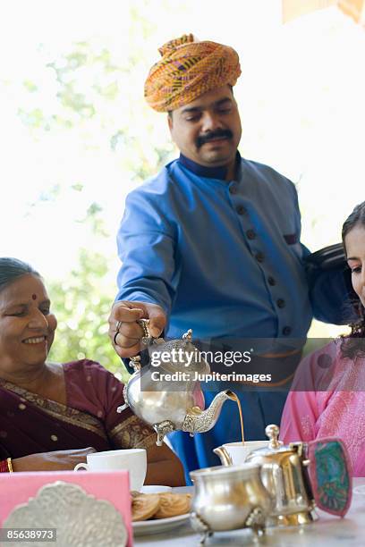 Butler Tea Ritual Butler Serving Tea Photos and Premium High Res Pictures - Getty Images