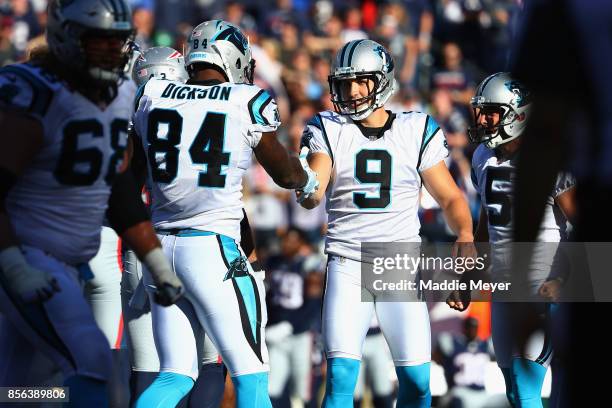 Graham Gano of the Carolina Panthers reacts after kicking a 48-yard field goal during the fourth quarter to defeat the New England Patriots 33-30 at...