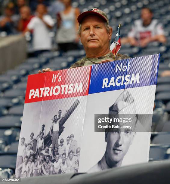 Fans making a statement about the recent national anthem protests during a football game at NRG Stadium on October 1, 2017 in Houston, Texas.