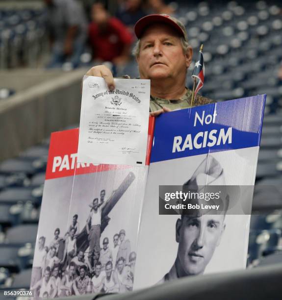 Fans making a statement about the recent national anthem protests during a football game at NRG Stadium on October 1, 2017 in Houston, Texas.