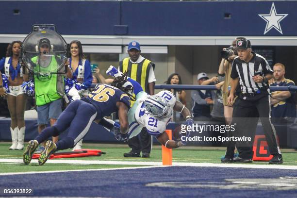 Dallas Cowboys running back Ezekiel Elliott dives into the end zone for a touchdown during the game between the Dallas Cowboys and the Los Angeles...