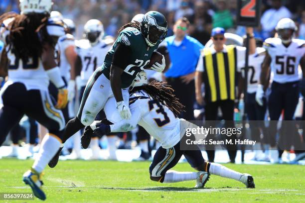 LeGarrette Blount of the Philadelphia Eagles rushes against Jahleel Addae of the Los Angeles Chargers during the NFL game the at StubHub Center on...