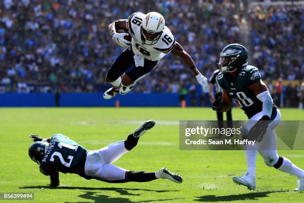 Patrick Robinson and Jordan Hicks of the Philadelphia Eagles defend against Tyrell Williams of the Los Angeles Chargers on a pass play during the...