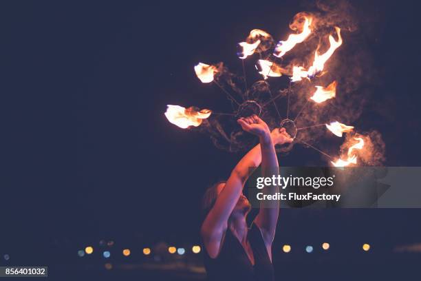 dangerous dance - circus lights stock pictures, royalty-free photos & images