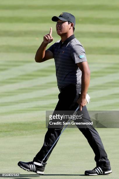 Si Woo Kim of South Korea and the International Team reacts on the 11th green during Sunday singles matches of the Presidents Cup at Liberty National...