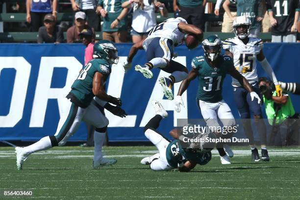 Patrick Robinson and Jordan Hicks of the Philadelphia Eagles defend against Tyrell Williams of the Los Angeles Chargers on a pass play during the...