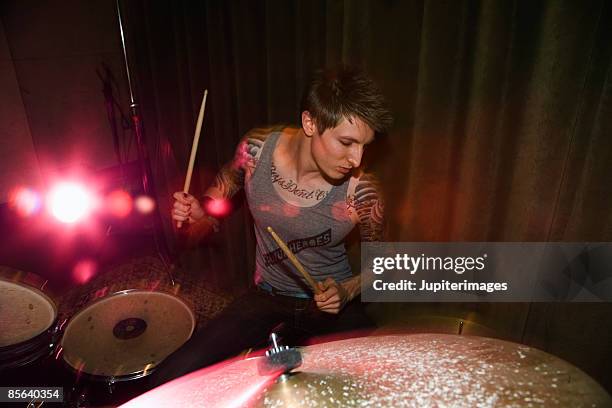 man playing drums - drummer stock pictures, royalty-free photos & images