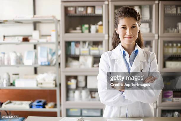 pharmacist in pharmacy - woman pharmacist stock pictures, royalty-free photos & images