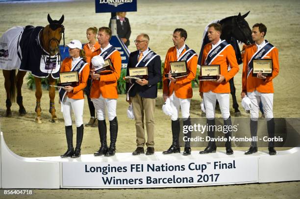 Harrie Smolders, Marc Houtzager, Michel Hendrix, Jur Vrieling, Annie Poels, chef d'equipe Rob Ehrens, during prize giving cerimony the Longines FEI...