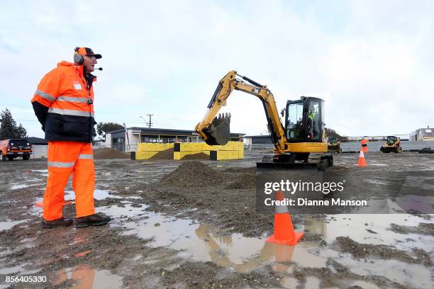 Guest is given instructions to control a digger at Dig This on October 2, 2017 in Invercargill, New Zealand. Guests are given the opportunity to...