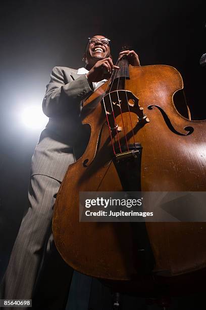 man playing double bass - jazz musician foto e immagini stock
