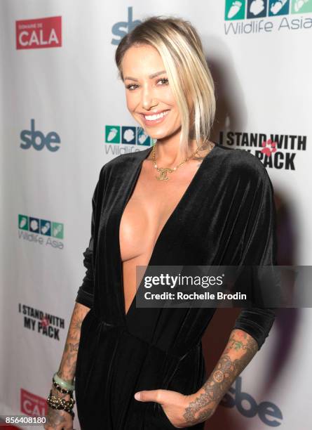 Model Tina Louise attends I Stand With My Pack's 'Rise Against Extinction' charity event on September 30, 2017 in Los Angeles, California.