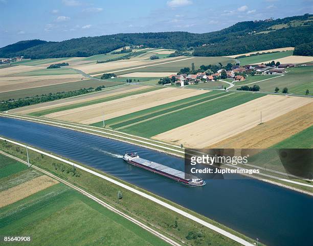 barge on canal , germany - barcaça imagens e fotografias de stock