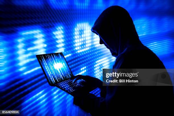 blue silhouette hacker - pirate criminal stock-fotos und bilder