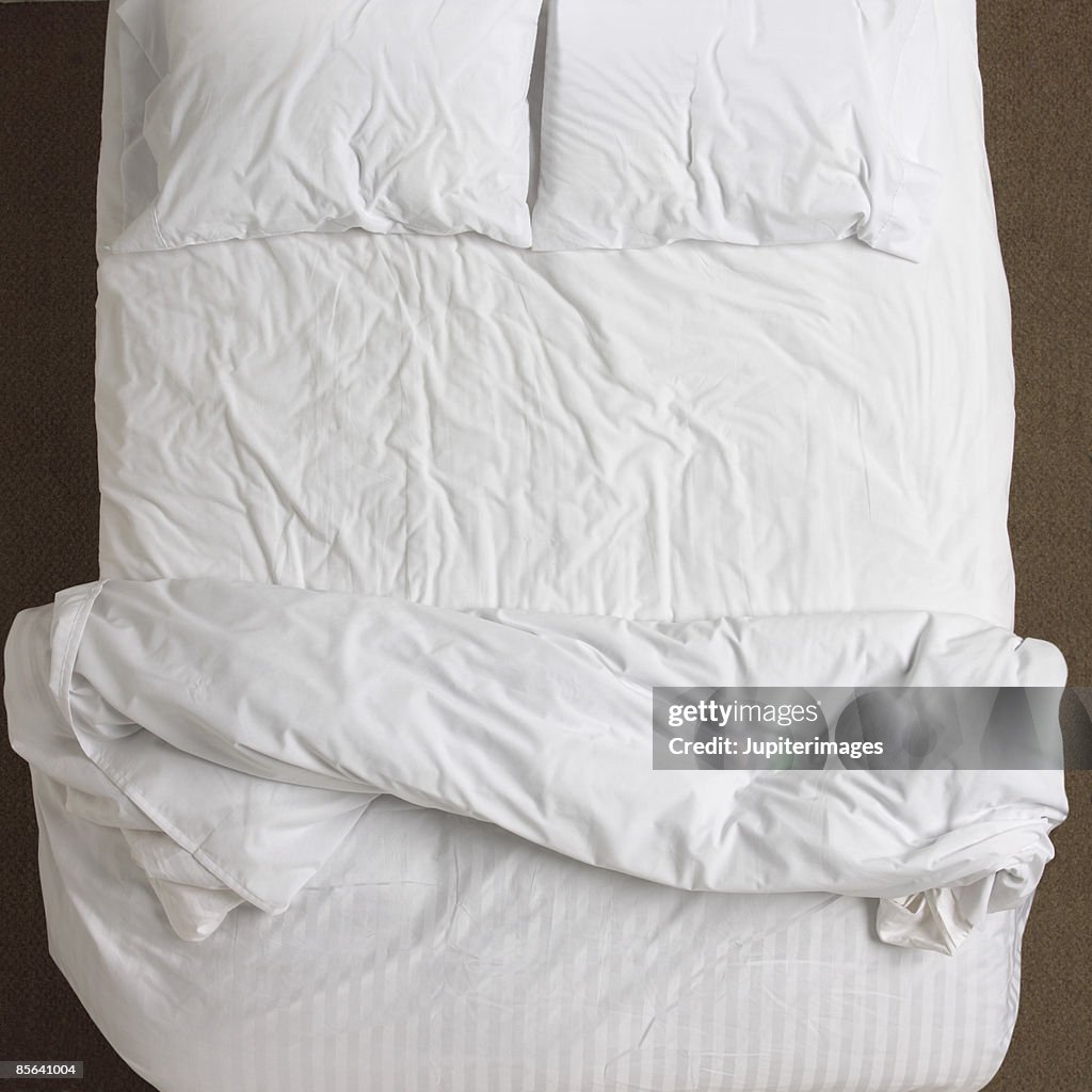 Unmade Unmade Bed High-Res Stock Photo - Getty Images