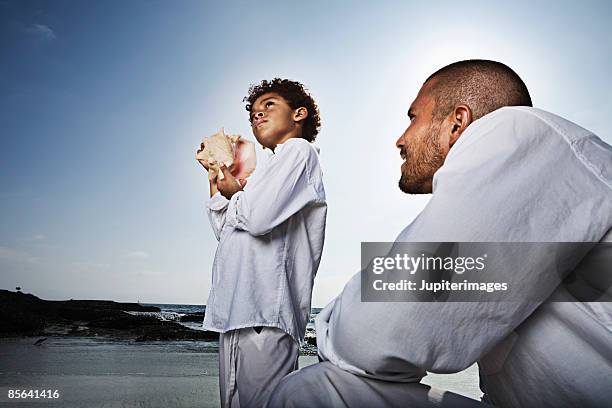 581 Listen Sea Shell Stock Photos, High-Res Pictures, and Images ...