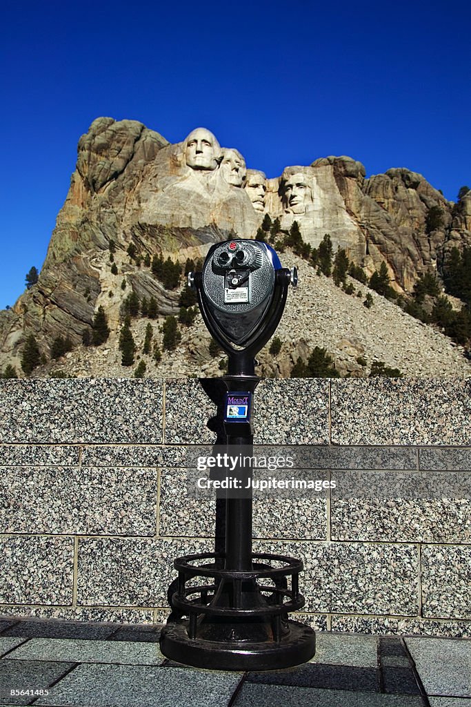 Observation binoculars looking at Mount Rushmore National Memorial, South Dakota