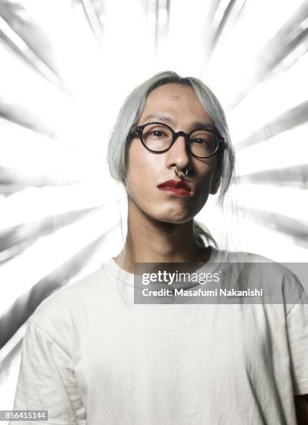 portrait of young japanese people with surrounded by a halo. - nose piercing stock pictures, royalty-free photos & images