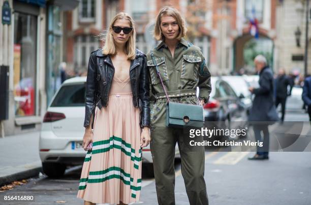 Elena Perminova and Arizona Muse seen outside Valentino during Paris Fashion Week Spring/Summer 2018 on October 1, 2017 in Paris, France.