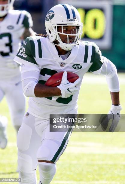 New York Jets cornerback Marcus Williams runs with the ball during the National Football League game between the Jacksonville Jaguars and the New...