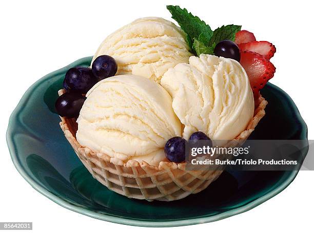 berries and ice cream in waffle cup - vanilla ice cream stock pictures, royalty-free photos & images