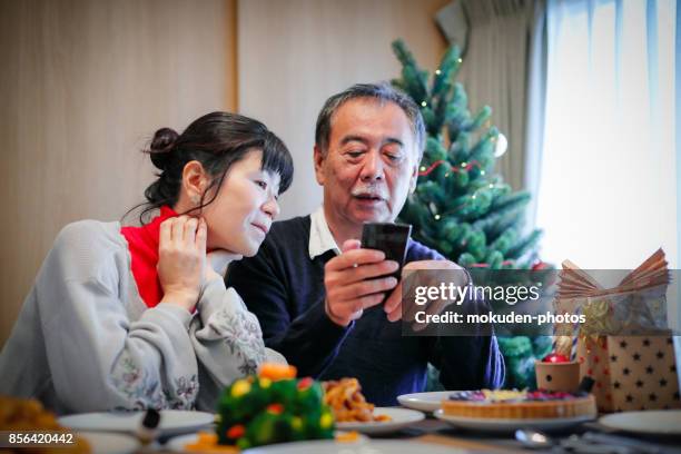 Christmas dinner table and senior couple