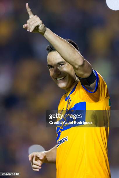 Juninho of Tigres celebrates after scoring his team's winning goal via penalty during the 12th round match between Tigres UANL and Chivas as part of...