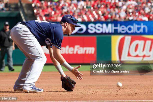 Milwaukee Brewers third baseman Hernan Perez fields the ball against the St. Louis Cardinals during a MLB baseball game between the St. Louis...