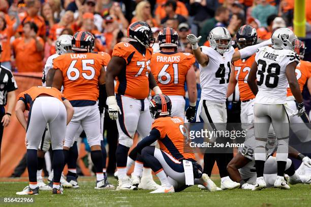 Erik Harris of the Oakland Raiders celebrates a missed field goal by Brandon McManus of the Denver Broncos during the fourth quarter on Sunday,...