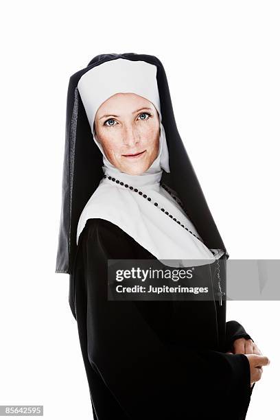 nun wearing rosary - nonne stock-fotos und bilder