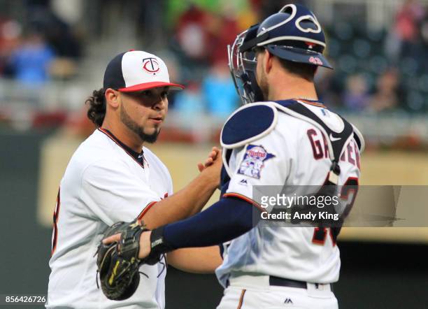 Gabriel Moya of the Minnesota Twins and Mitch Garver of the Minnesota Twins after defeating the Detroit Tigers during their baseball game on October...