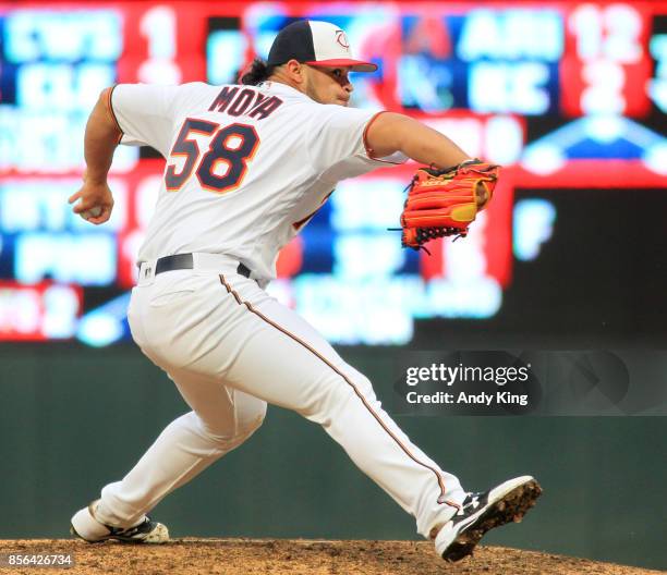 Gabriel Moya of the Minnesota Twins pitches against the Detroit Tigers in the ninth inning during their baseball game on October 1 at Target Field in...