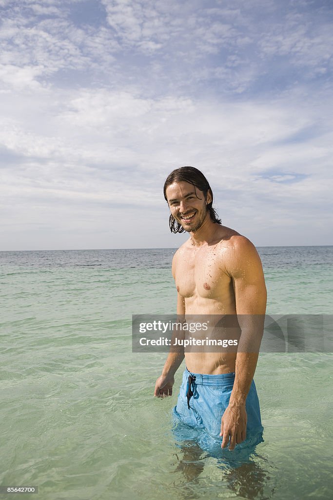 Man standing in ocean