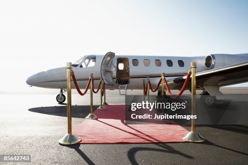 Private airplane with red carpet Private airplane with red carpet