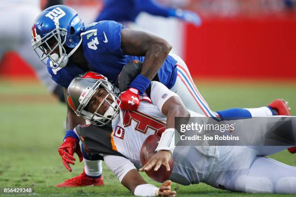 Dominique Rodgers-Cromartie of the New York Giants sacks Jameis Winston of the Tampa Bay Buccaneers in the third quarter of a game at Raymond James...