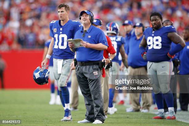 Head coach Ben McAdoo and Eli Manning of the New York Giants react on the sideline in the fourth quarter of a game against the Tampa Bay Buccaneers...