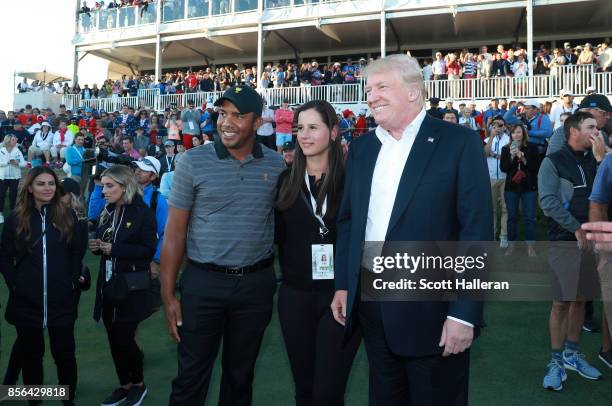 President Donald Trump poses with Jhonattan Vegas of Venezuela and the International Team and his wife wife Hildegard Vegas during the trophy...