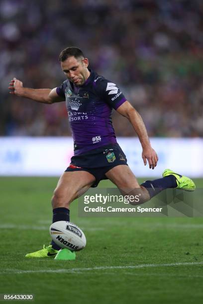 Cameron Smith of the Storm kicks during the 2017 NRL Grand Final match between the Melbourne Storm and the North Queensland Cowboys at ANZ Stadium on...