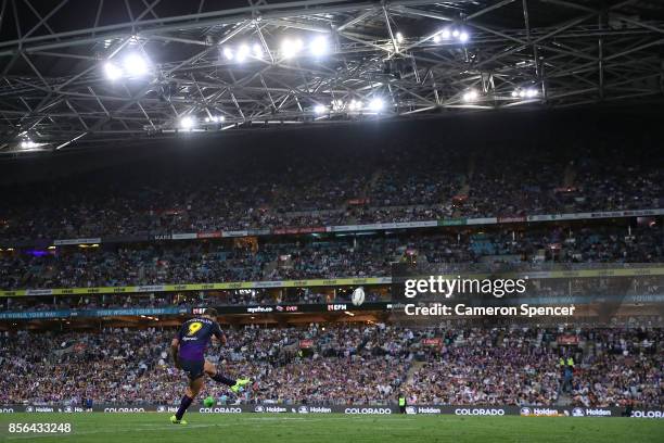 Cameron Smith of the Storm kicks during the 2017 NRL Grand Final match between the Melbourne Storm and the North Queensland Cowboys at ANZ Stadium on...