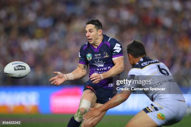 Billy Slater of the Storm passes the ball during the 2017 NRL Grand Final match between the Melbourne Storm and the North Queensland Cowboys at ANZ...