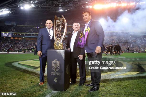 Former Cowboys player Matt Bowen and former Storm player Tawera Nikau pose alongside Arthur Summons and the Provan-Summons Trophy before the 2017 NRL...