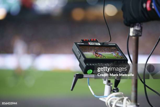 Roving TV cameraman films the 2017 NRL Grand Final match between the Melbourne Storm and the North Queensland Cowboys at ANZ Stadium on October 1,...