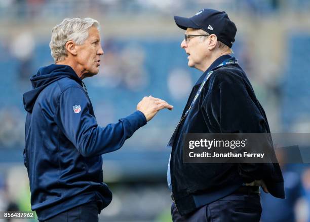 Head coach Pete Carroll talks with Seahawks owner Paul Allen on the field before the game at CenturyLink Field on October 1, 2017 in Seattle,...