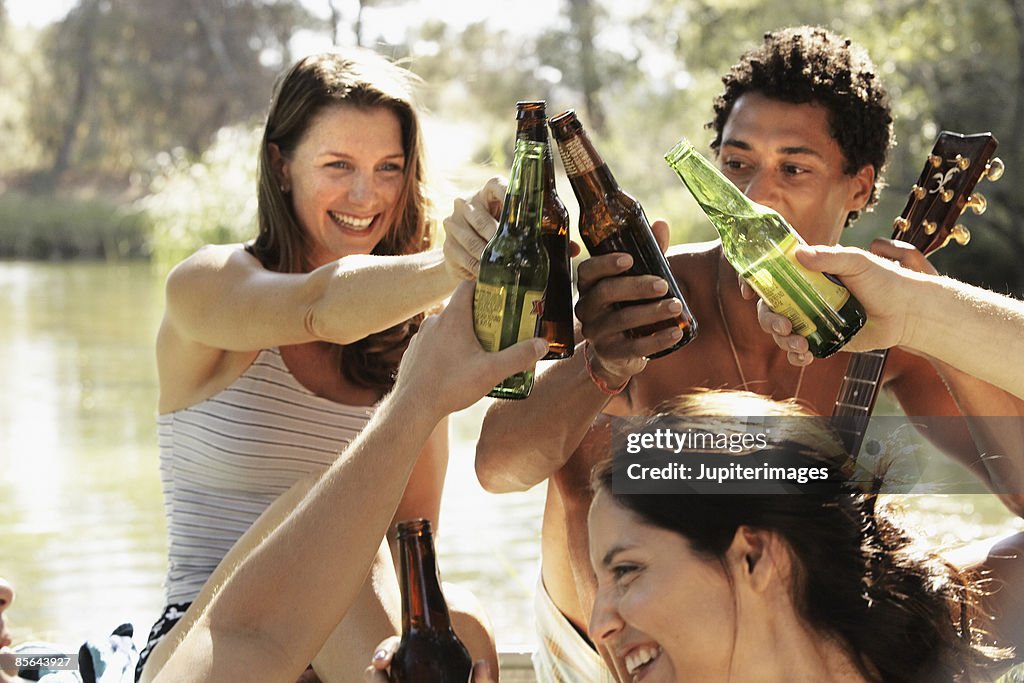 Friends toasting with beer