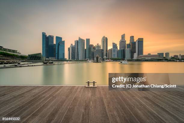 silky skies - marina bay - singapore stock pictures, royalty-free photos & images